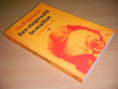 Tweedehands boek: Een stopnaald in maillot van auteur Dolf Jansen - Paperback, in goede staat.