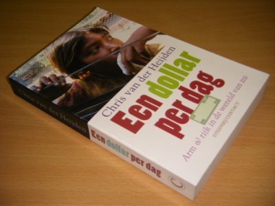 Tweedehands boek: Een dollar per dag van auteur Chris van der Heijden - Paperback, in goede staat.