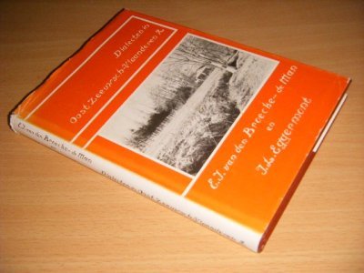 Tweedehands boek: Dialecten in Oost-Zeeuwsch-Vlaanderen 2 van auteur E.J. van den Broecke-de Man en J.L. Eggermont - Gebonden met stofomslag, gebruikssporen, in goede staat. Geillustreerd.